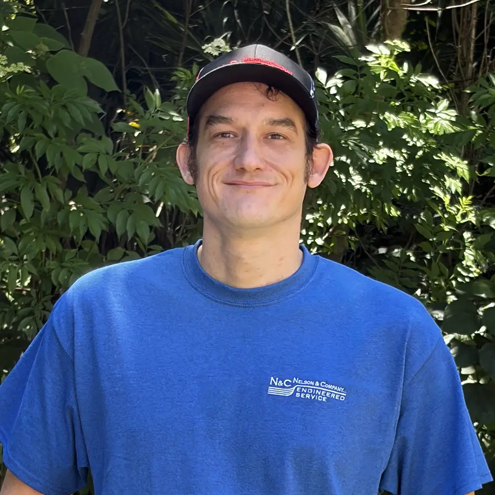 Nelson & Company About | Travis Zeagler